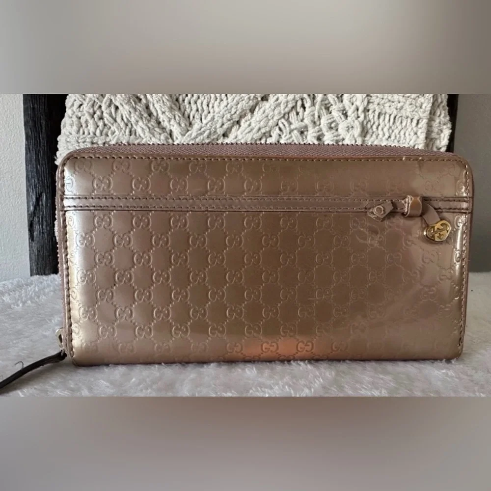 Gucci Shimmering Bronze Embossed Logo Wallet Pouch - Picture 2 of 4